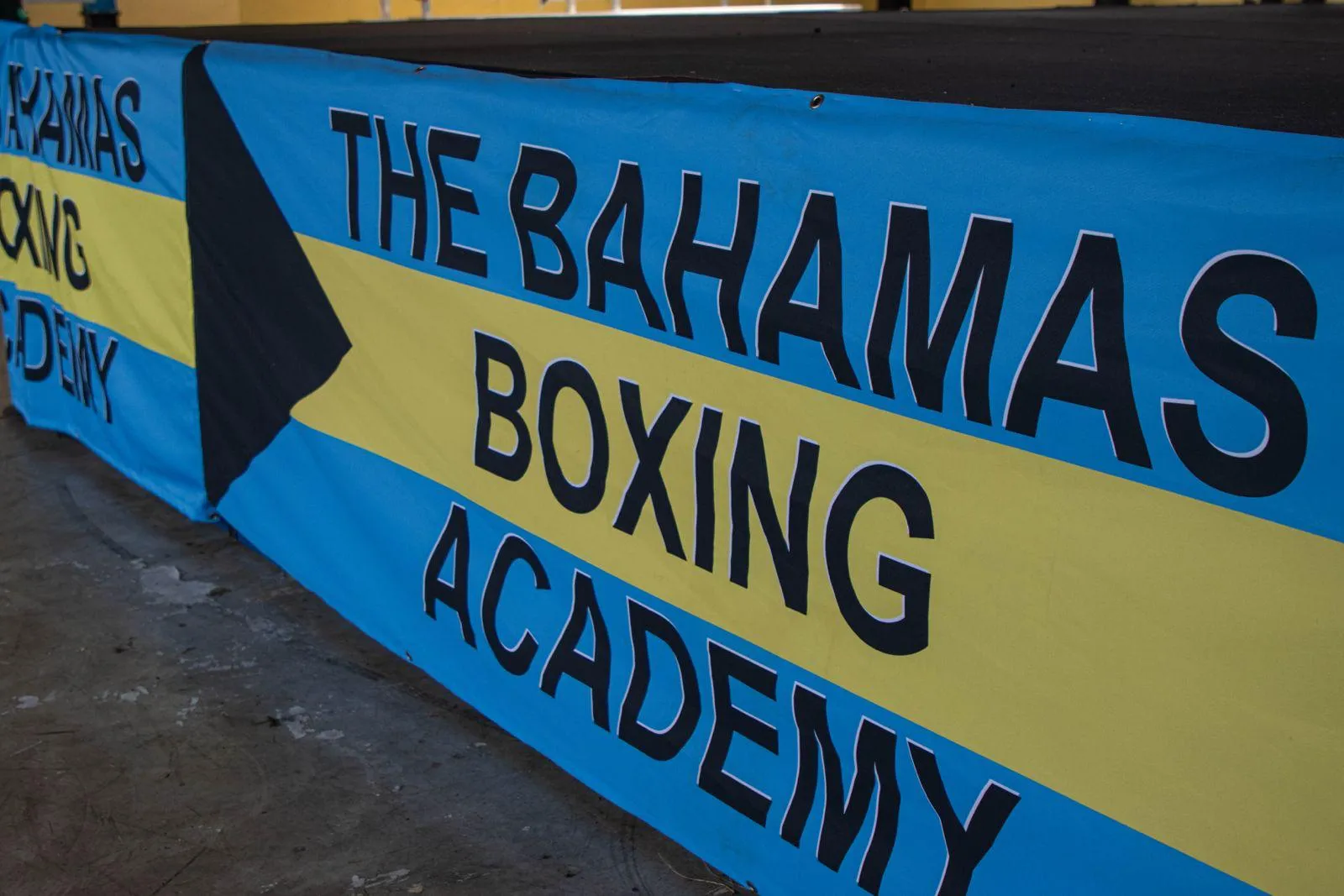 The Bahamas Boxing Academy banner on the side of the boxing ring