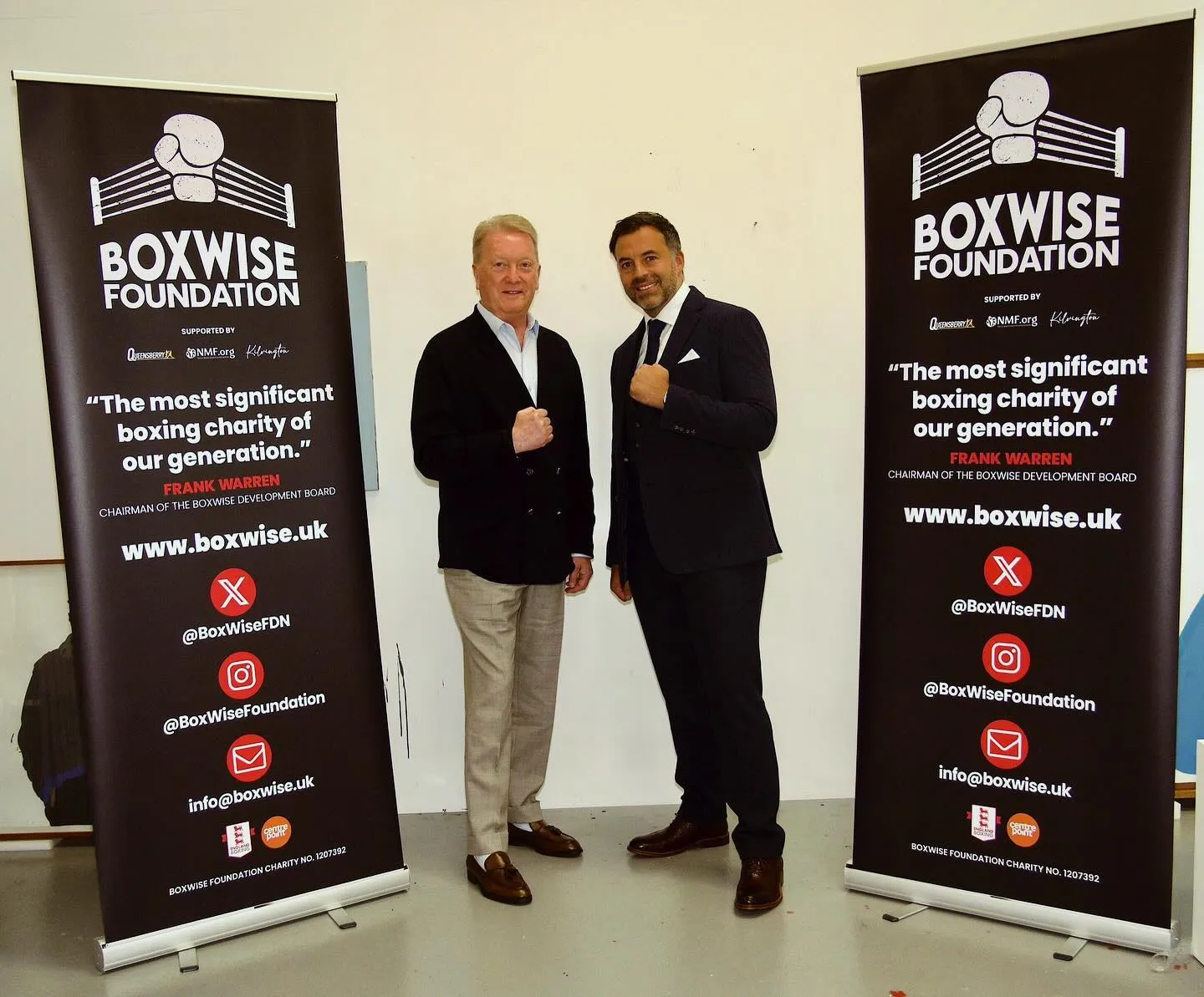 Frank Warren and Rick Ogden between BoxWise banners