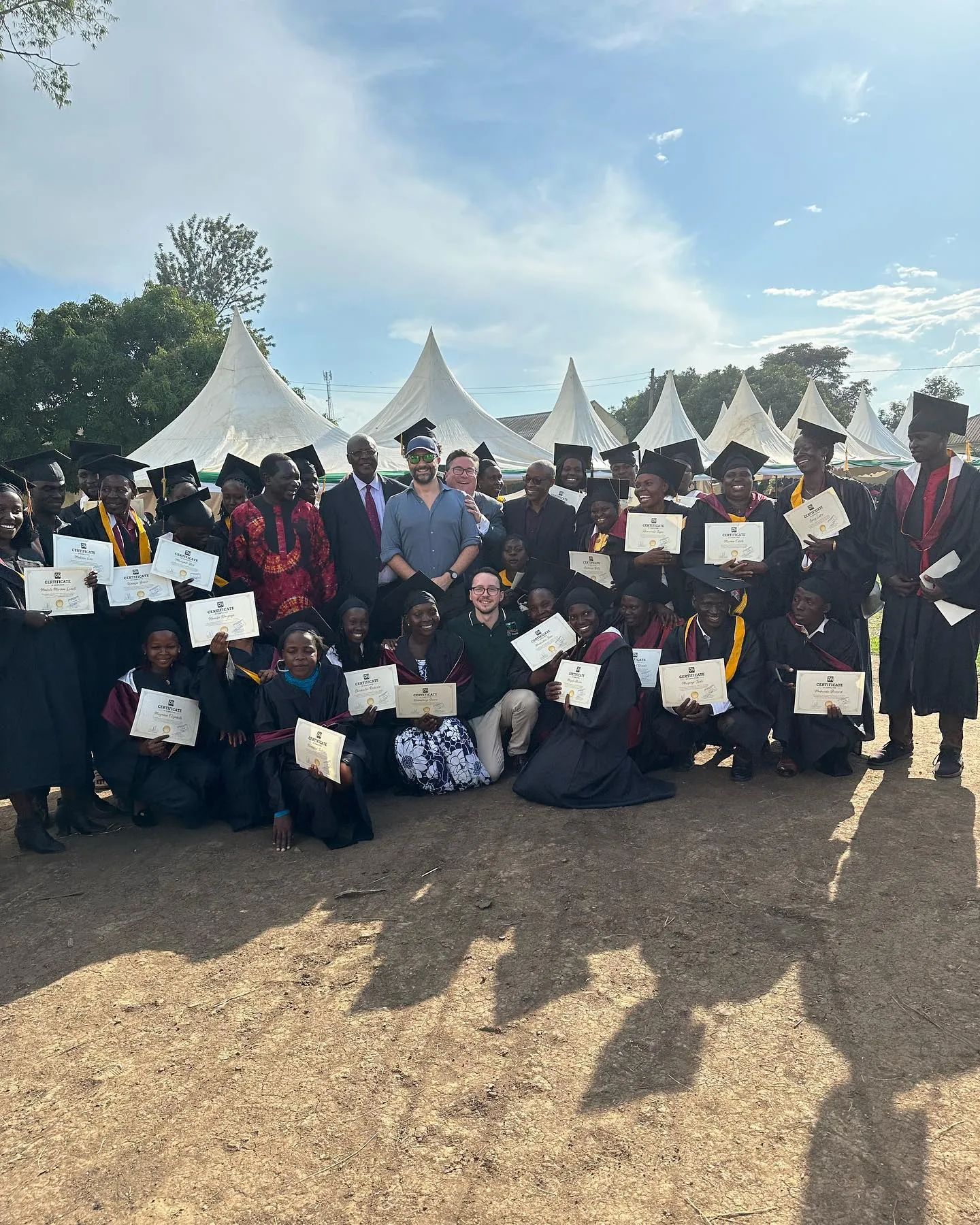 Graduates with their certificates outside the NMF ICT Centre